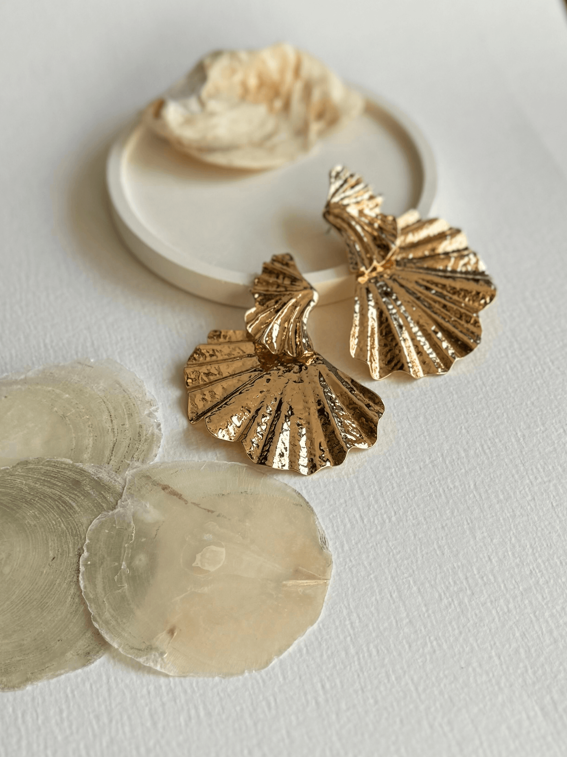 Reef - Gold dangler earrings