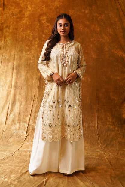 Regal Cream Dream: High-Slit Kurta with Tassels & Palazzo Pants