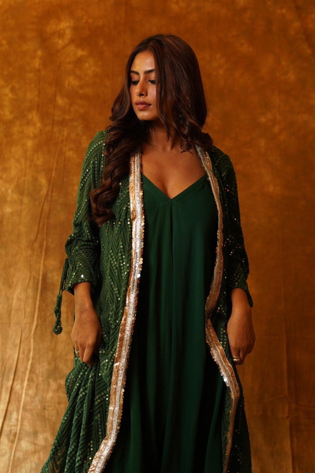 Emerald jumpsuit with mirrorwork and overlay jacket